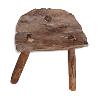 Ancient tripod milking stool