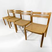Dining chairs J.H. Møller model 401 in oak with original Danish cord — Denmark, 1970s