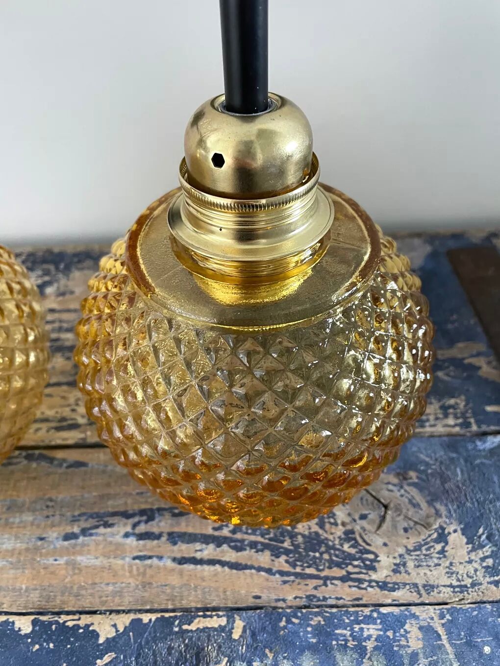Pair of vintage sconces in electrified golden glass to nine