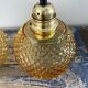 Pair of vintage sconces in electrified golden glass to nine