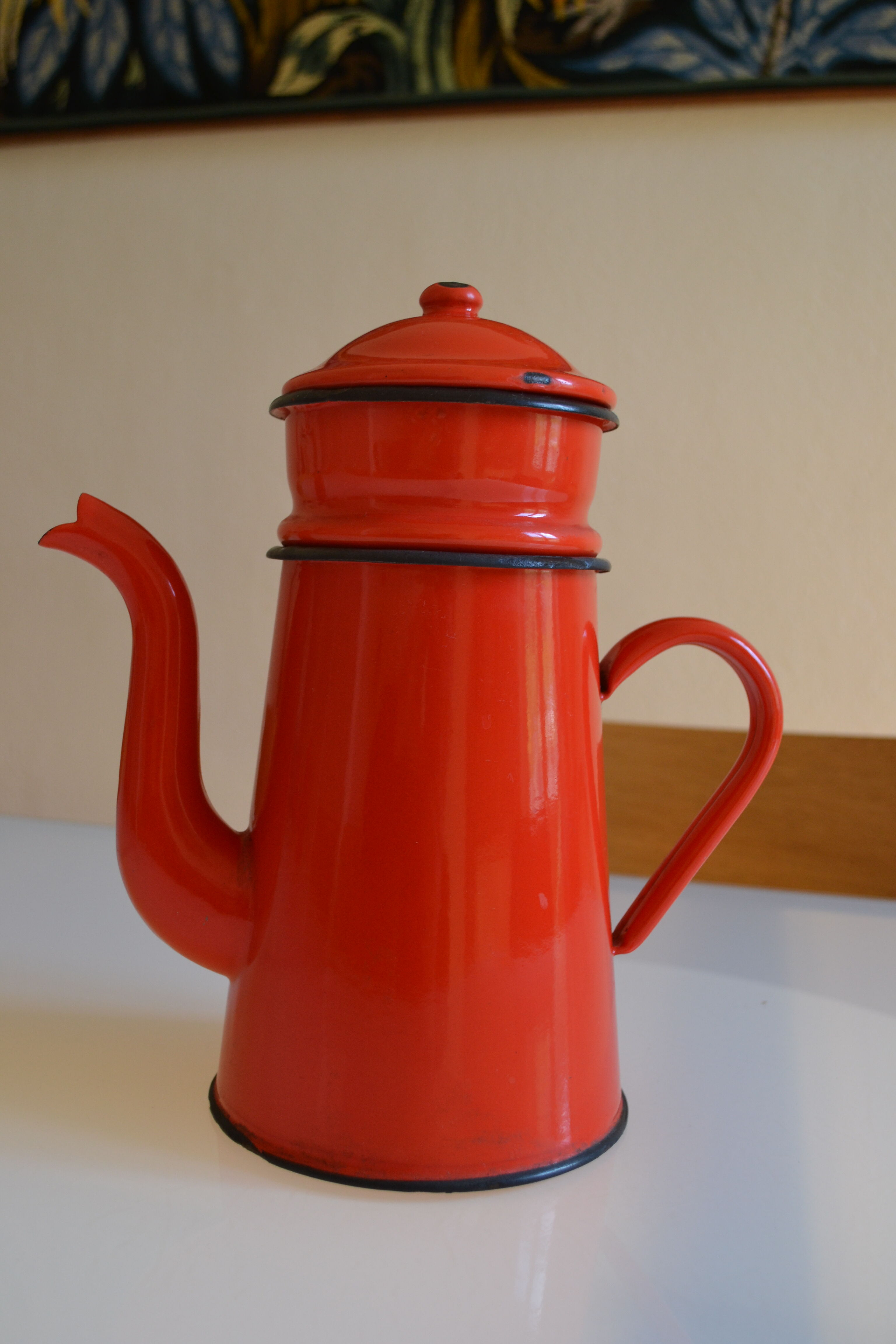 Vintage coffee maker in red and black enamelled sheet