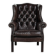 Dark brown cowhide Chesterfield wingback armchair in classic English style