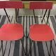 Table formica yellow and 2 red chairs
