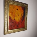 Abstract painting with golden frame