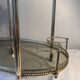 Neoclassical bar cart in gilded brass and smoked glass