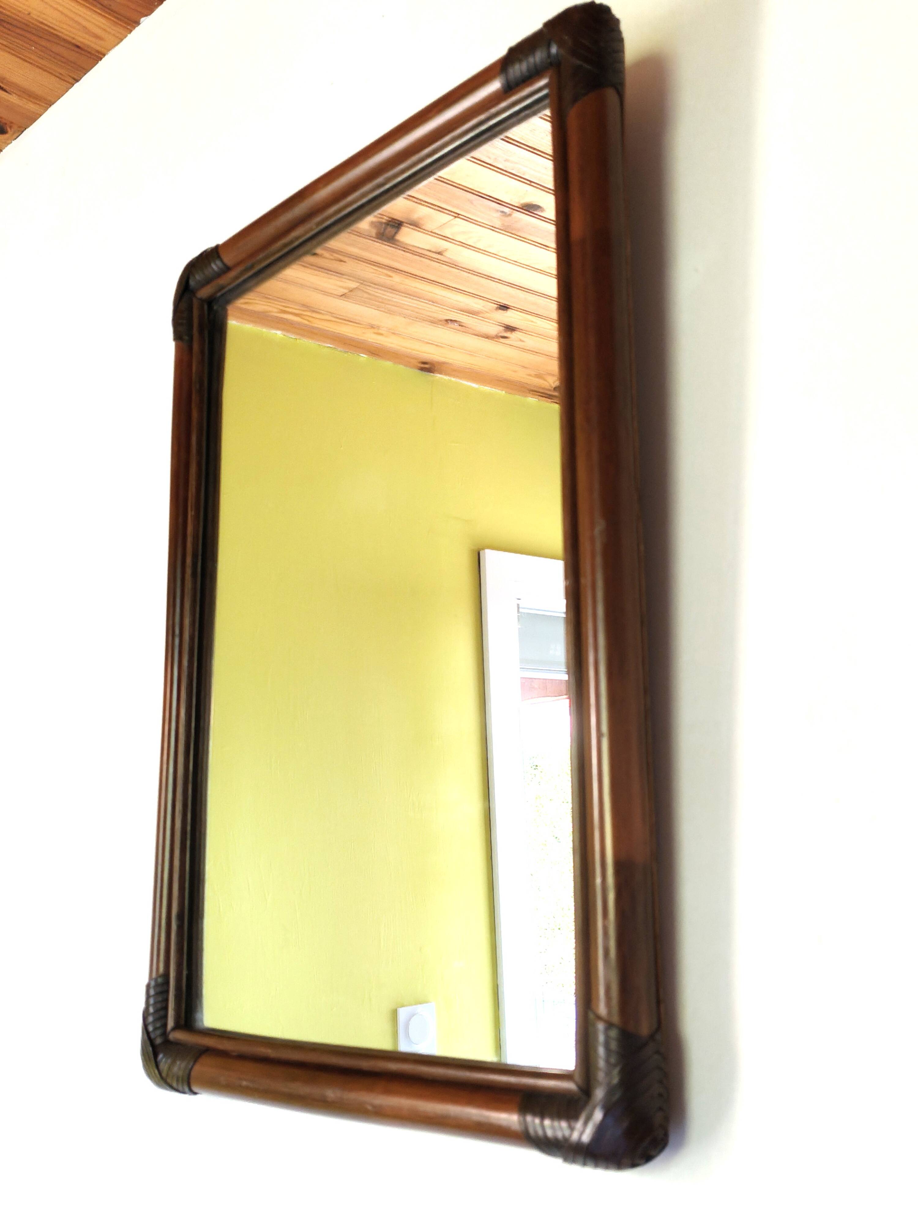 Antique mirror in bamboo and woven leather