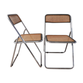 Paire de chaises pliantes en cannage et tube chromé