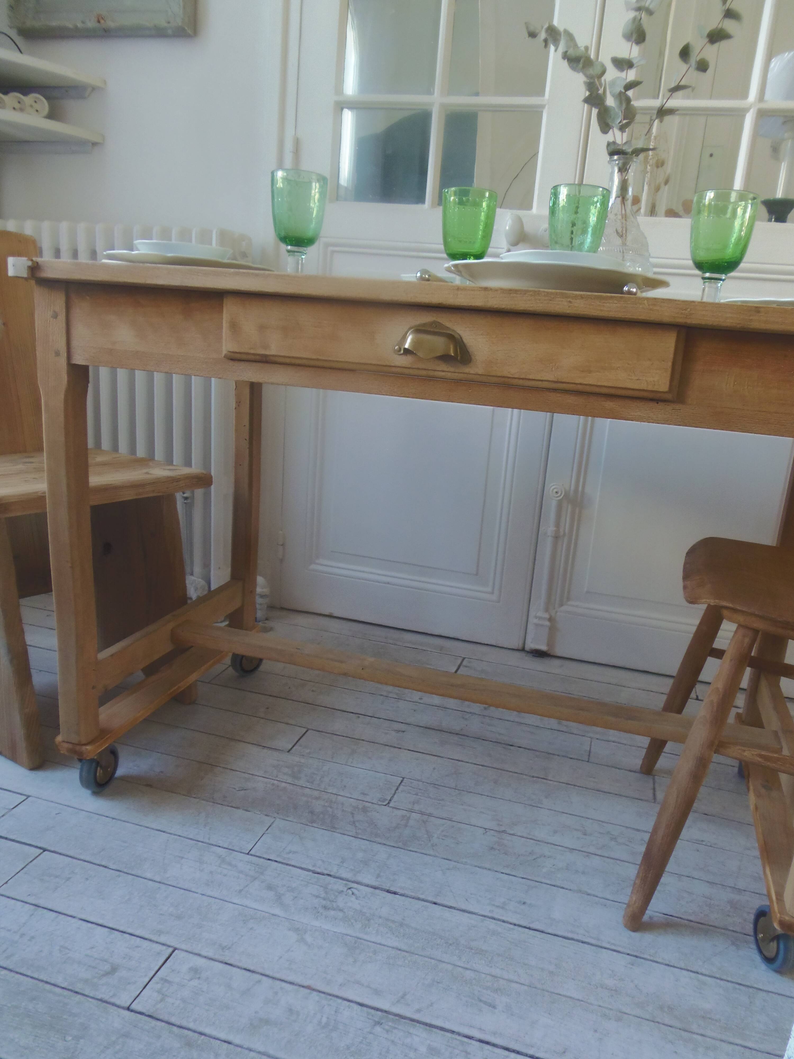 Vintage kitchen table on casters.