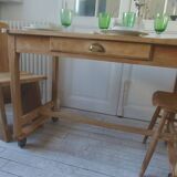 Vintage kitchen table on casters.