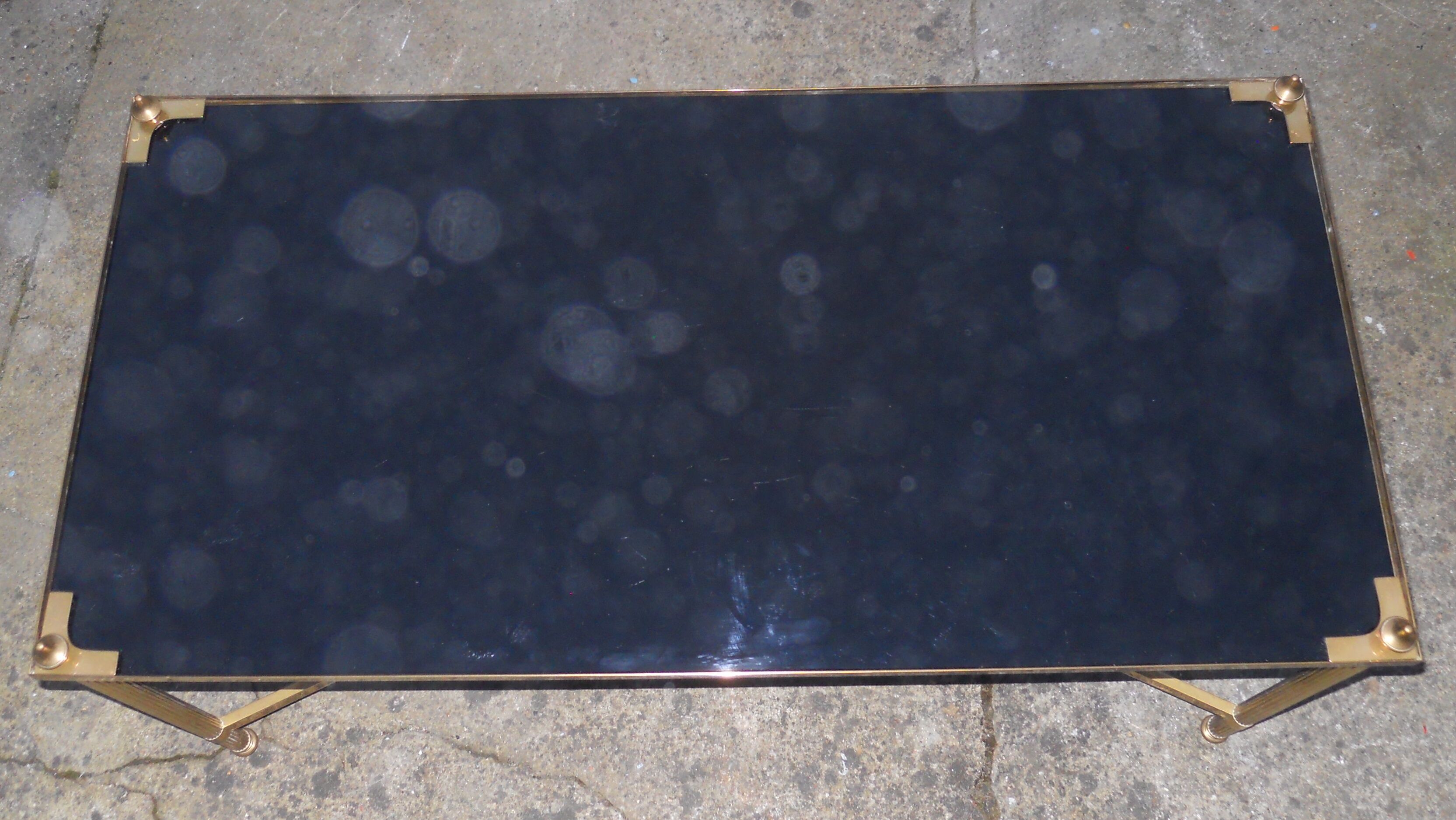 Bronze coffee table and black glass