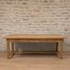 Large solid wood table with a sleek design – integrated storage.