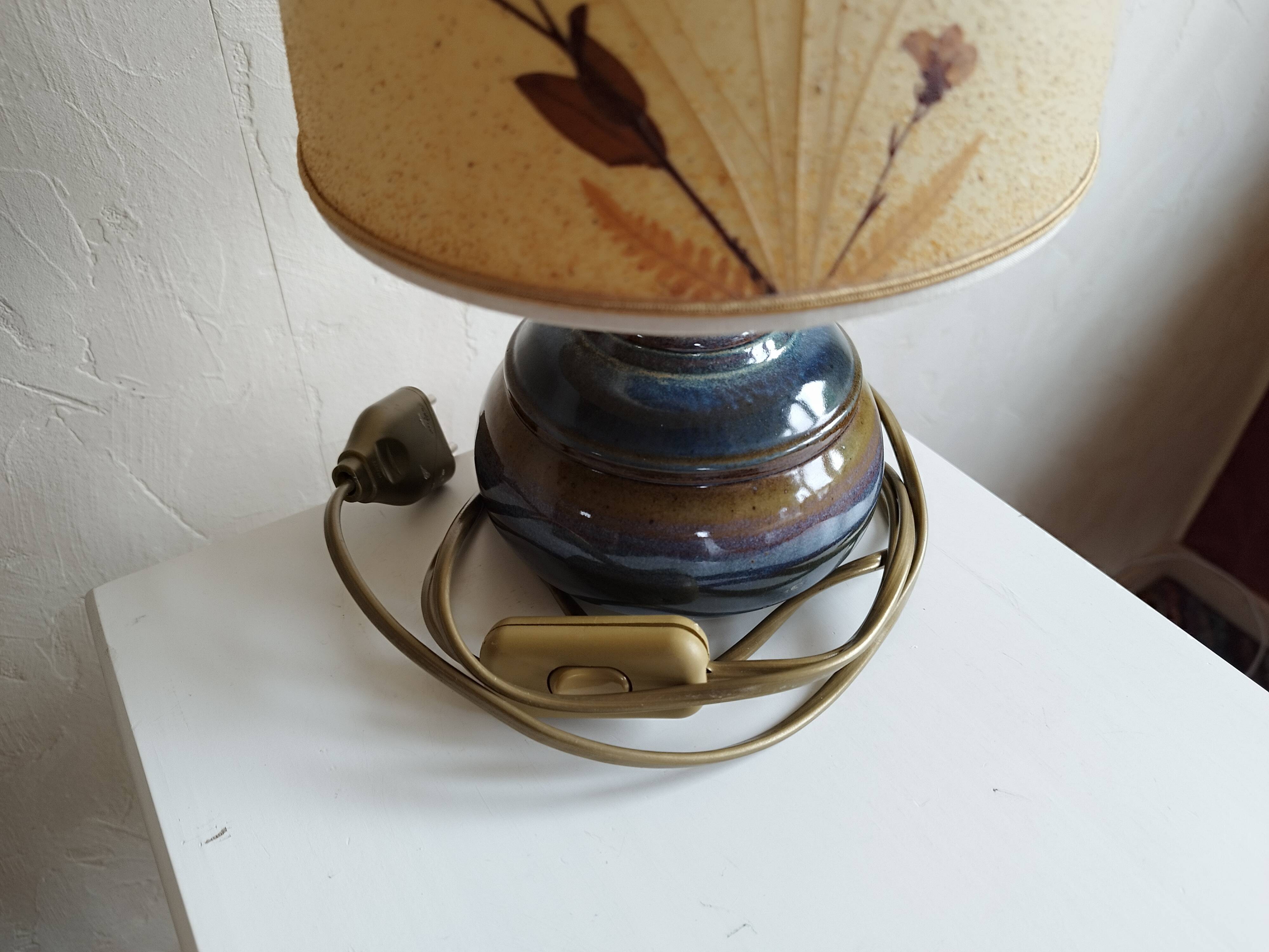 Sandstone lamp and dried flowers