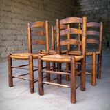 Set of 4 straw-covered brutalist chairs by George Robert