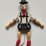 Articulated wooden puppet