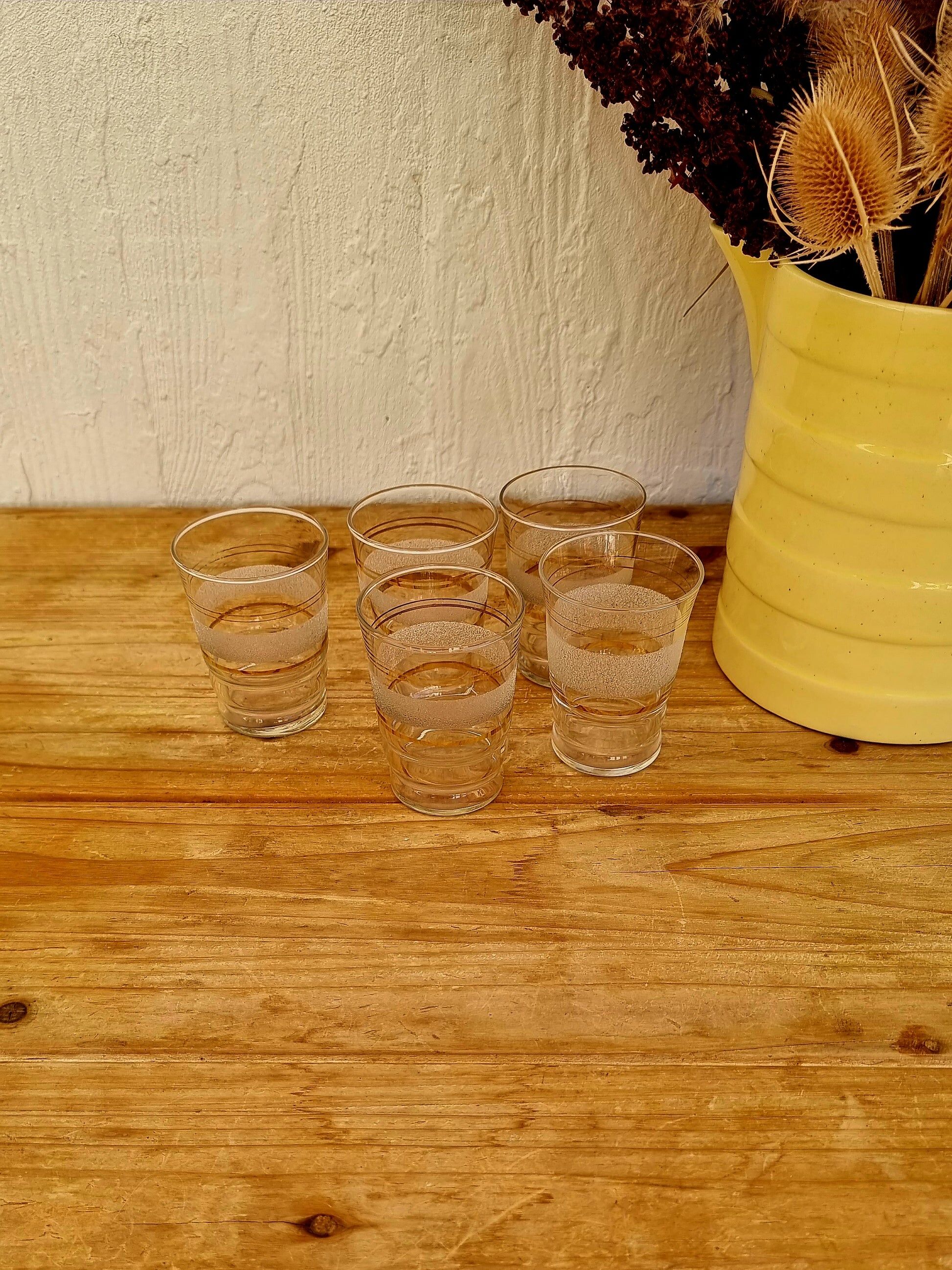 Set of 5 vintage white and gold granite glasses