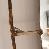 Oval mirror in art deco brass, Italy 1940s.