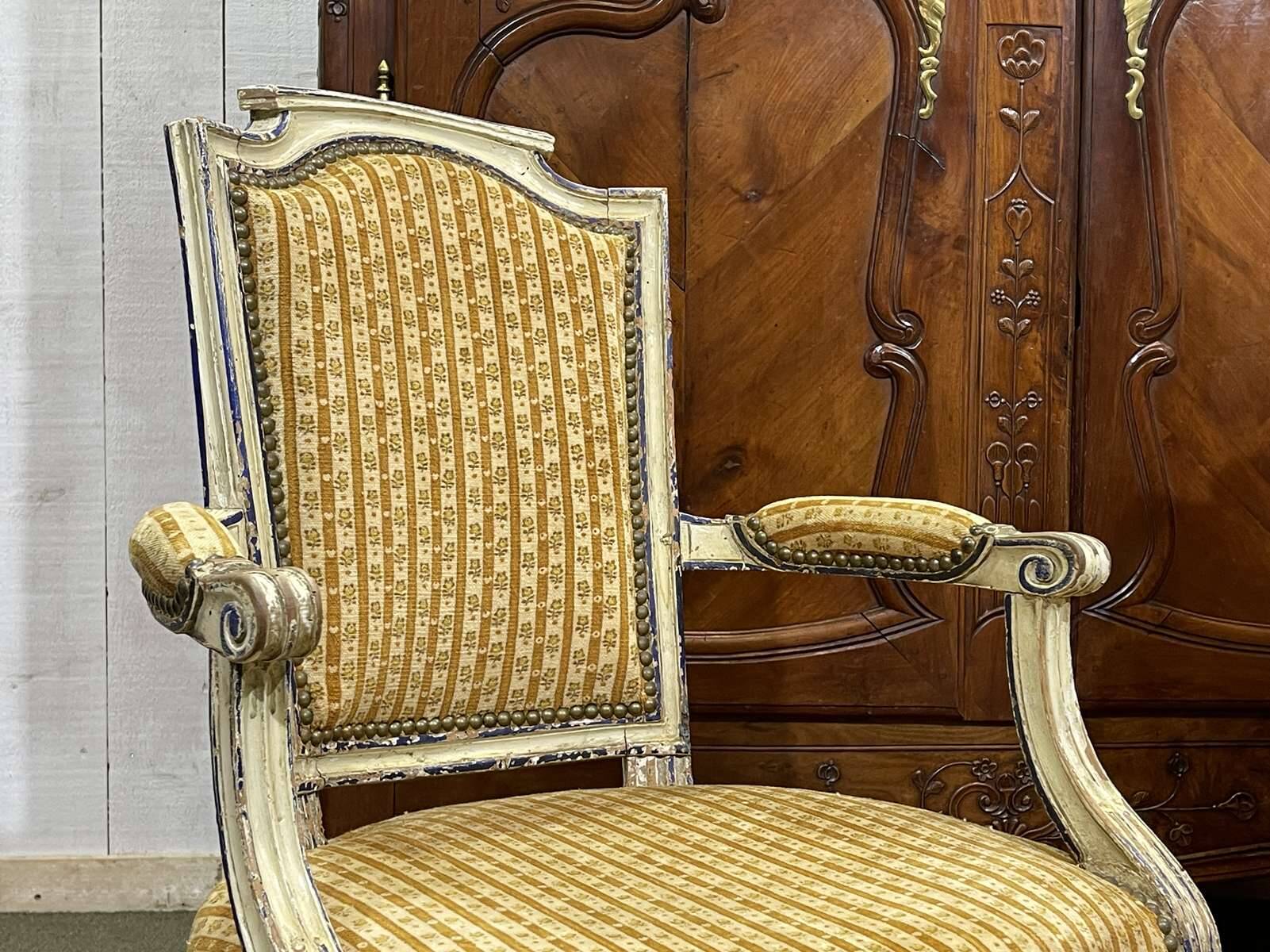 Pair of Louis XVI period cabriolet chairs in beech.