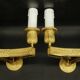 Pair of wall sconces in Restoration style, early 19th century - gilded bronze signed MENE.