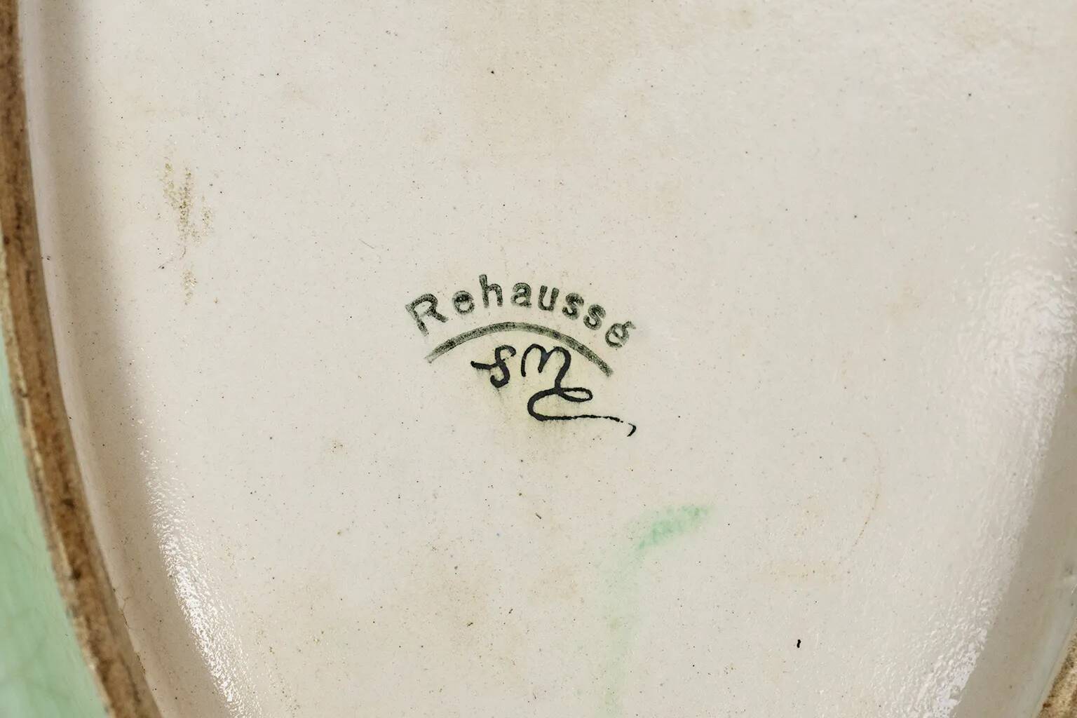 Longwy cup in cloisonné enamels on a green background, polychrome floral decoration and gold