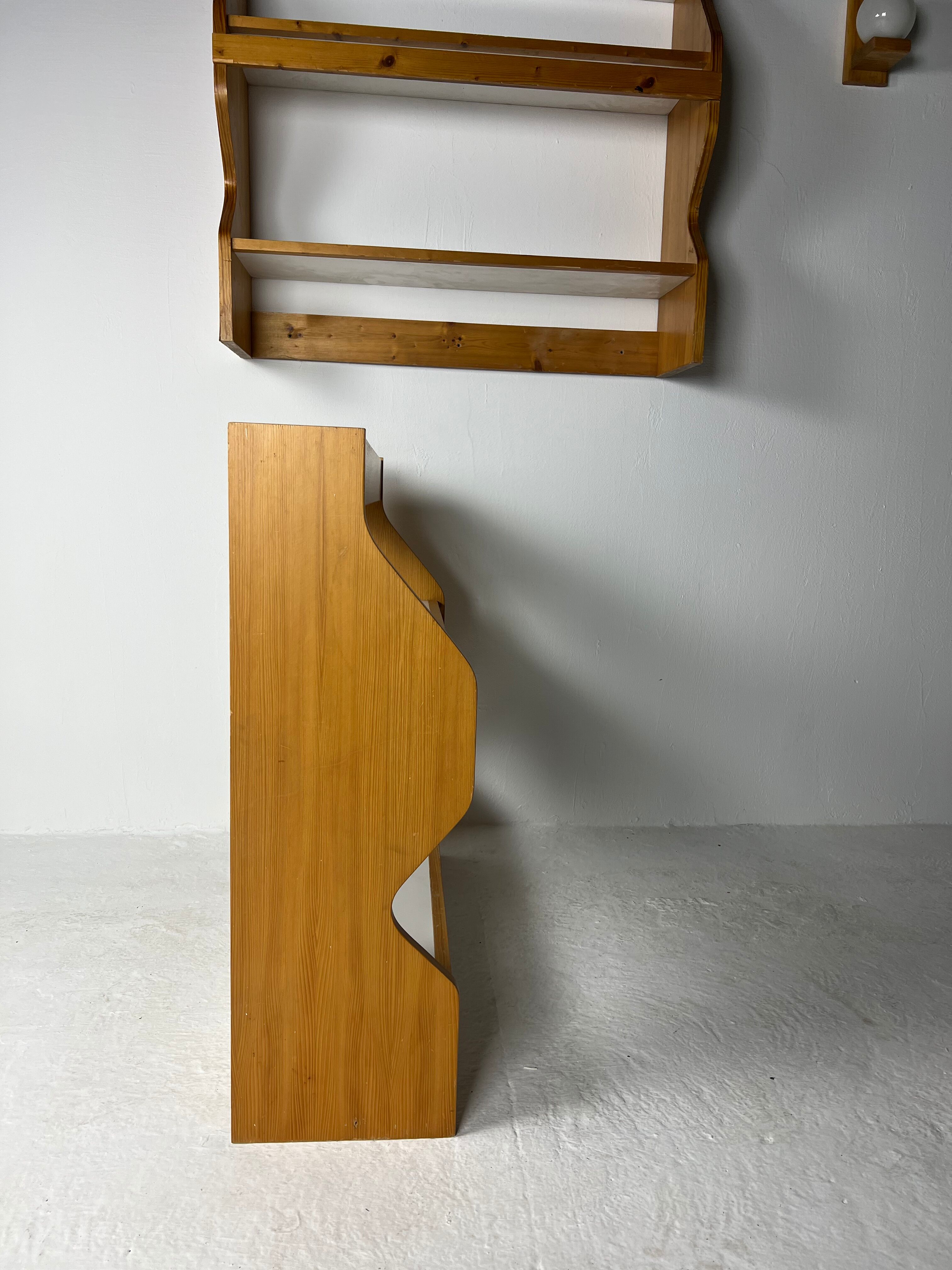 Duo of shelves by Charlotte Perriand