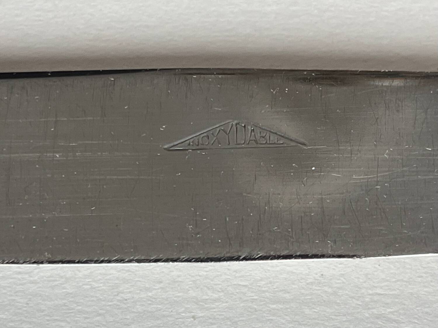 11 silver metal knives