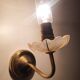Pair of antique gold candlestick wall sconces