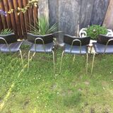 4 Chairs with chrome tubular metal base and black Skaï