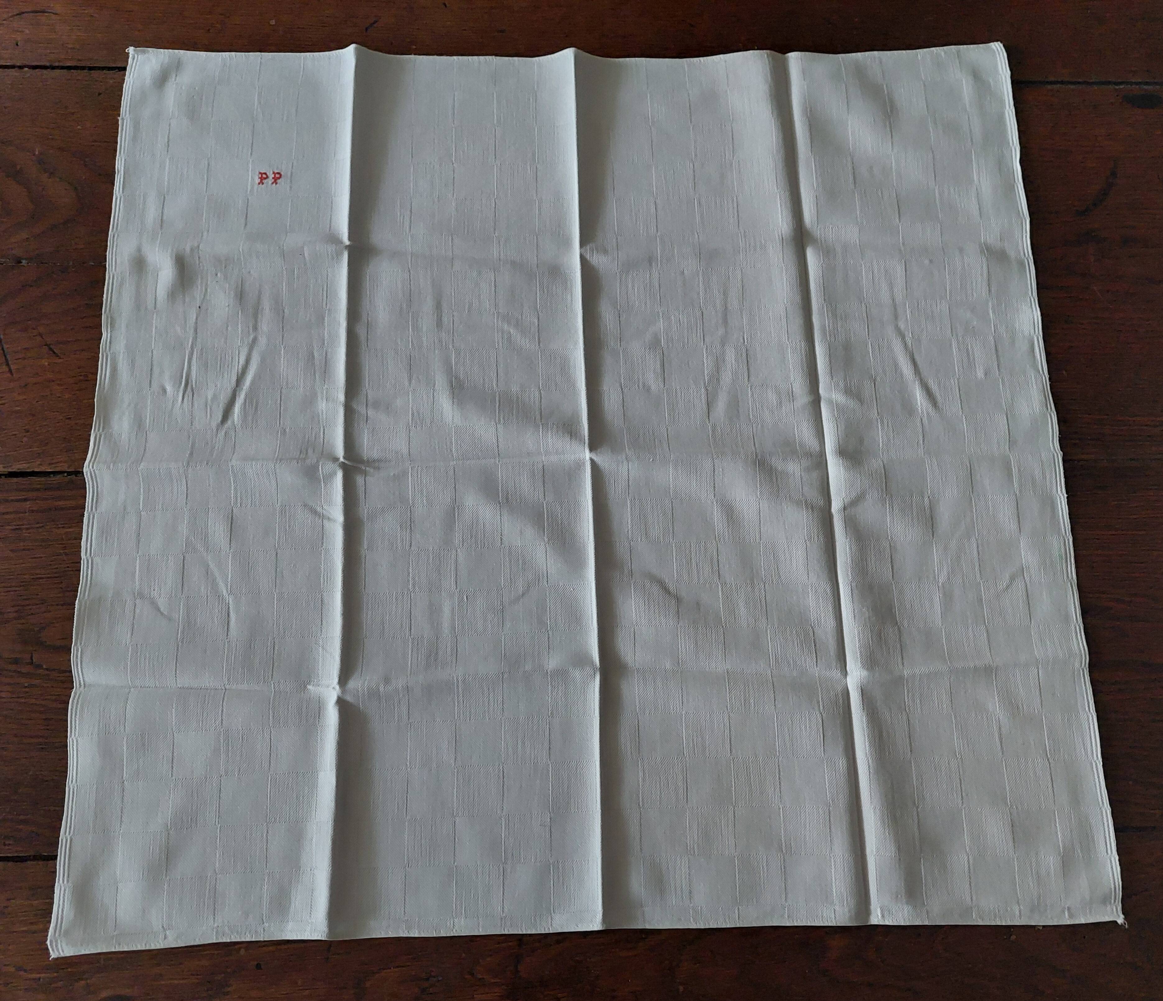 Set of seven monogram PP damask cotton napkins 56 x 56 cm