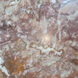 Carved wooden side table, red marble top embedded