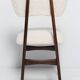 20th-century walnut and light cream boucle butterfly chair, Europe, 1960.