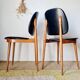 Paire de chaises vintage 1960 – Pieds compas & Simili-cuir noir