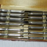 Set of 12 silver-plated metal knives