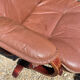 Scandinavian brown leather recliner lounge chair with ottoman, circa 1990