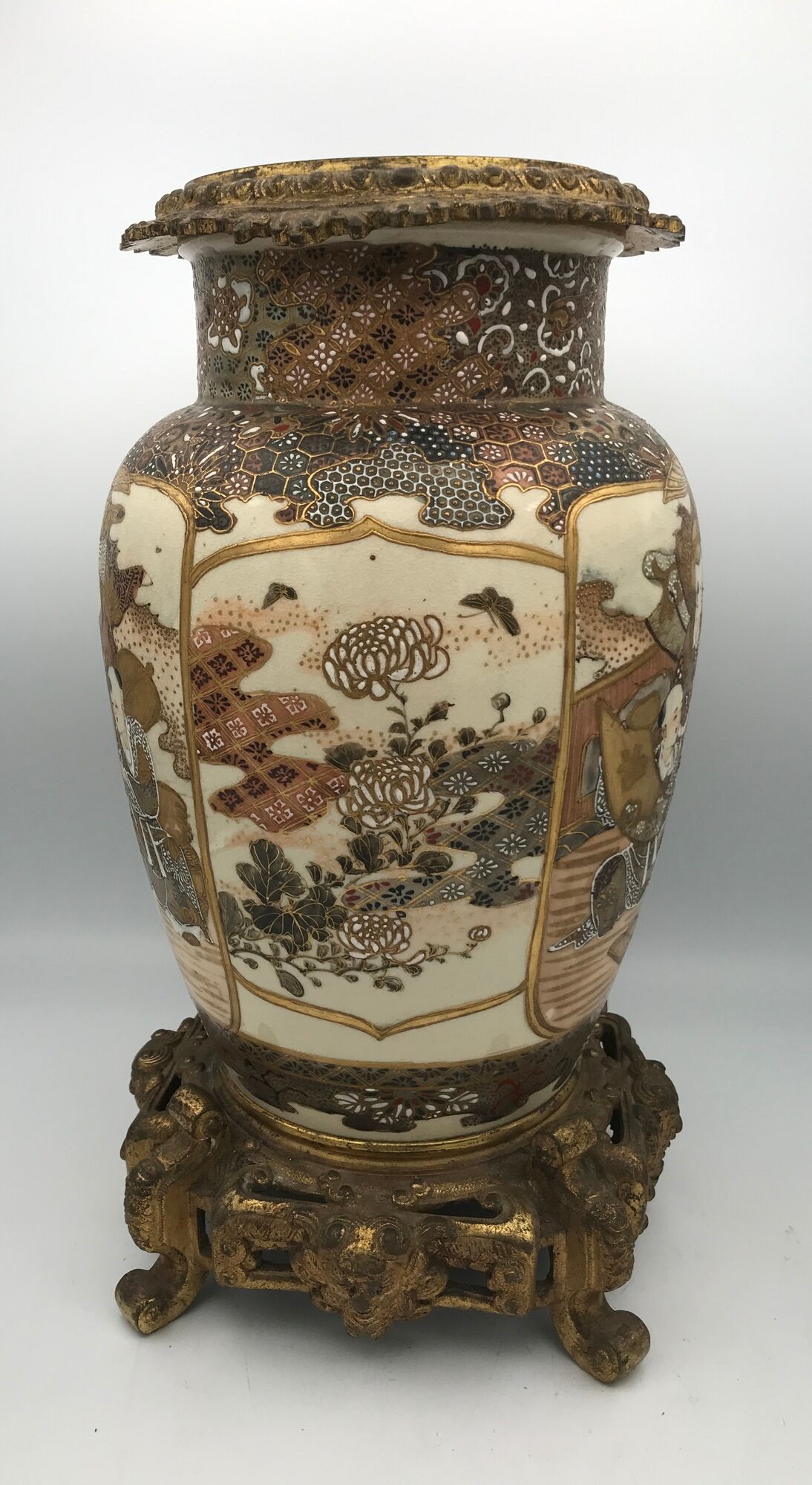 Old satsuma ceramic vase with various decorations mounted on bronze
