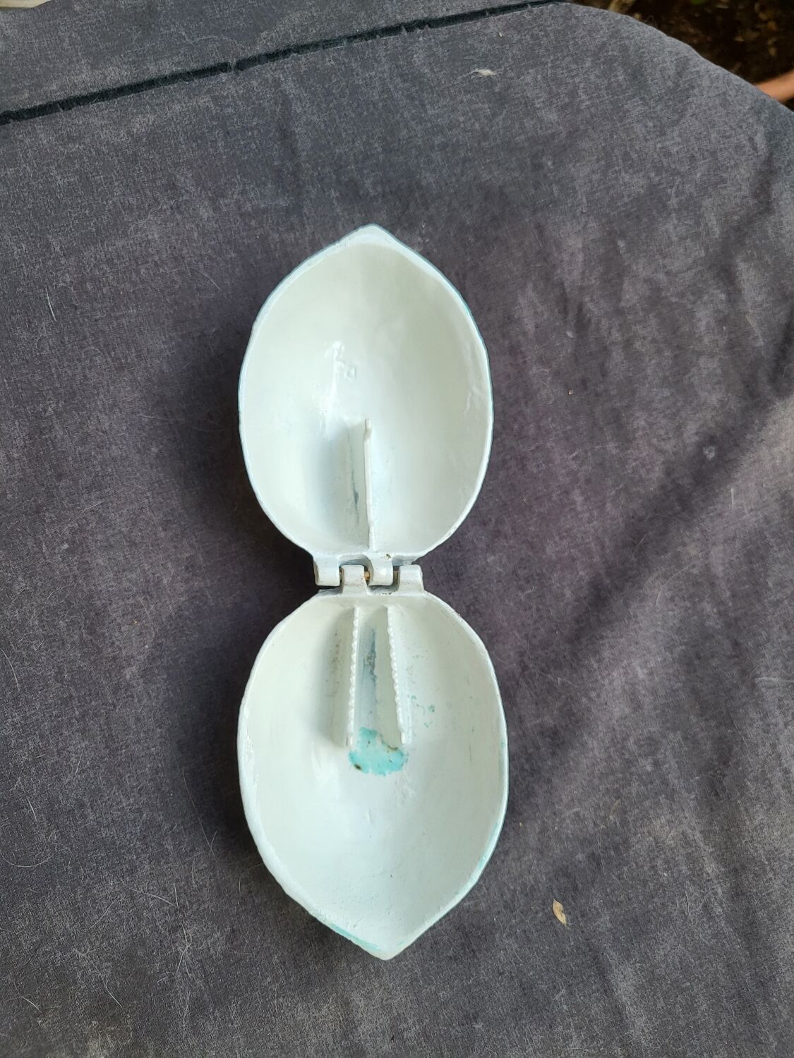 Vintage cast iron nut crate