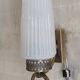 Modernist wall lights in brass and opaline - mid 20th century.