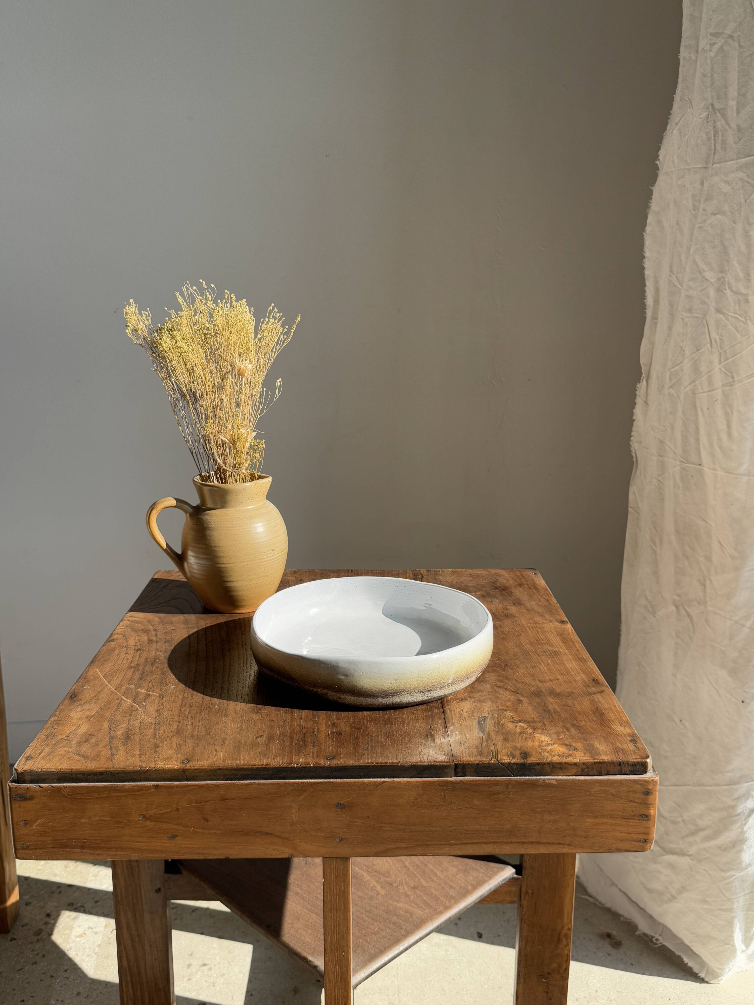 Large white and earthenware ceramic dish