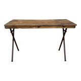 Folding workshop table with a metal frame and solid teak top.