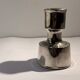 Metal candlestick by Jens Quistgaard for the brand Dansk Designs.