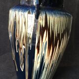 Ceramic vase glazed with two triangular handles