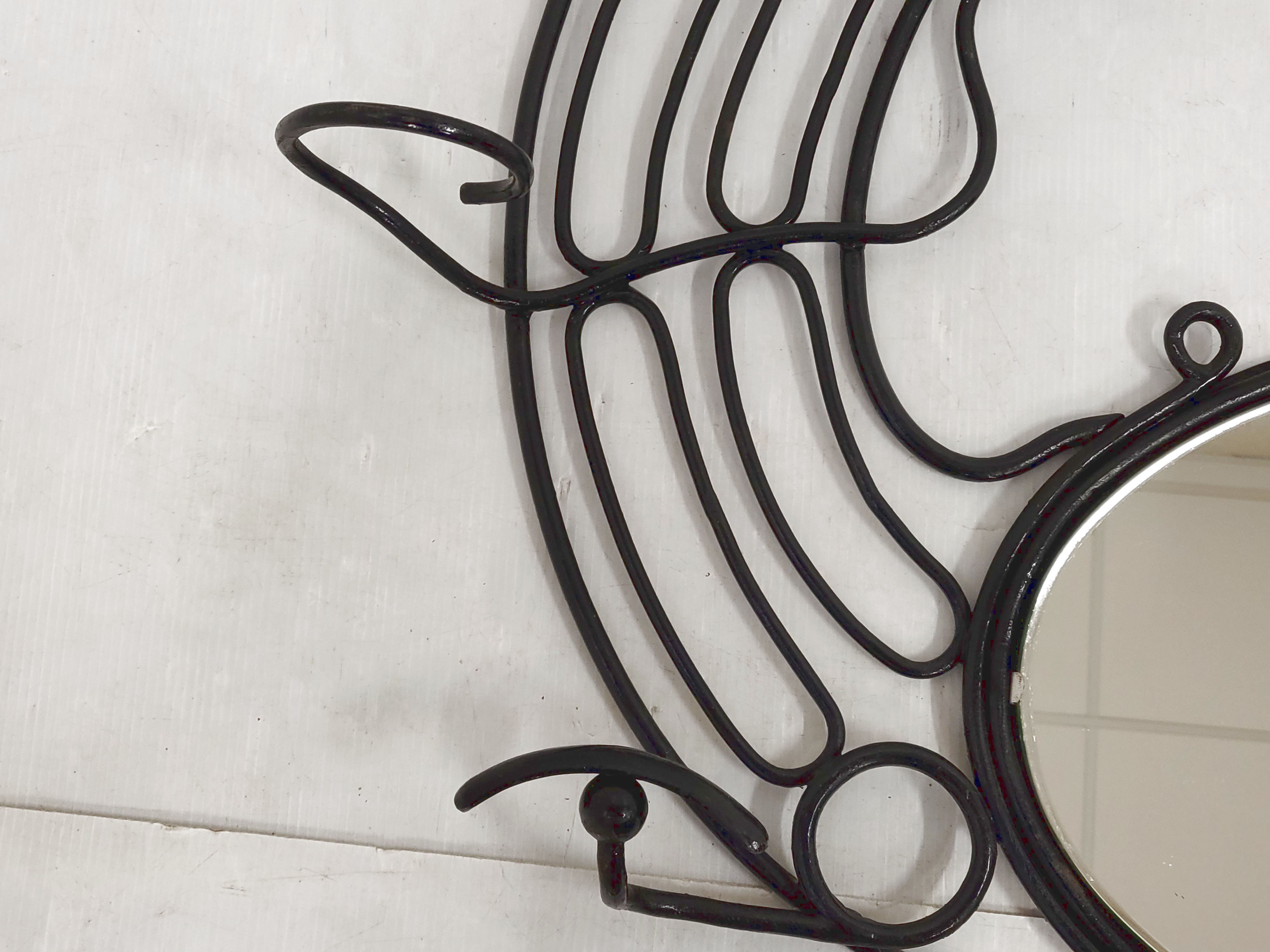 Vintage plant-bearing mirror in art nouveau style