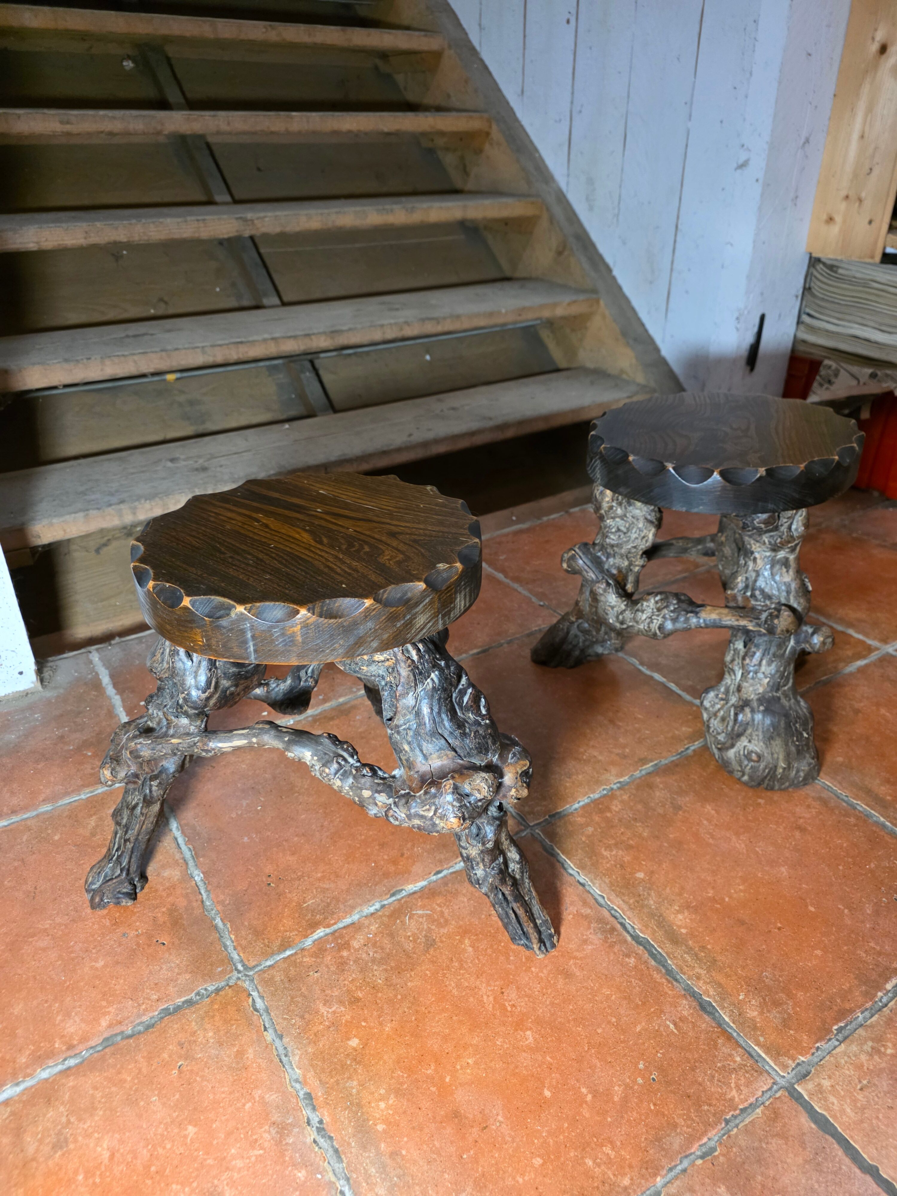 Pair of tripod stools with vine legs, oak top.