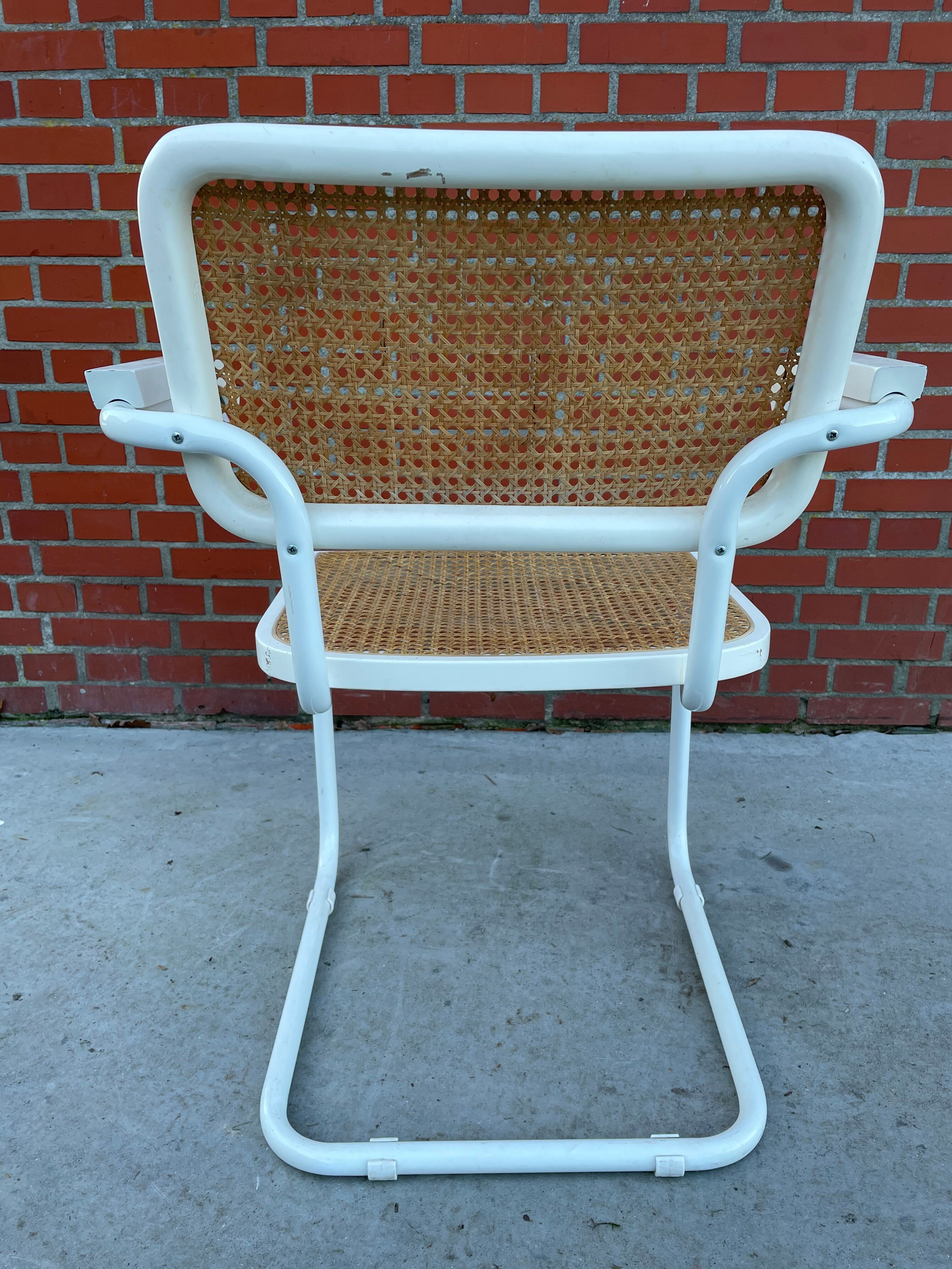 Cesca Chair model with armrest in white