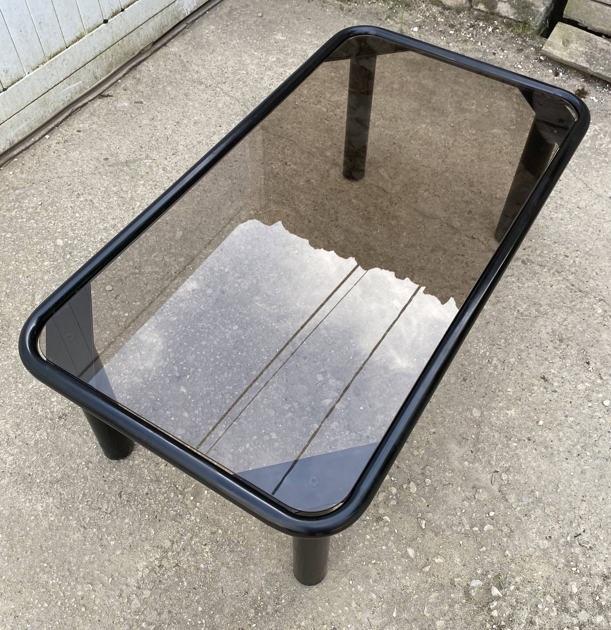 Vintage black tubular coffee table with smoked glass by Yves Boutboul, 1980.