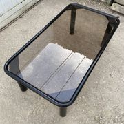 Vintage black tubular coffee table with smoked glass by Yves Boutboul, 1980.
