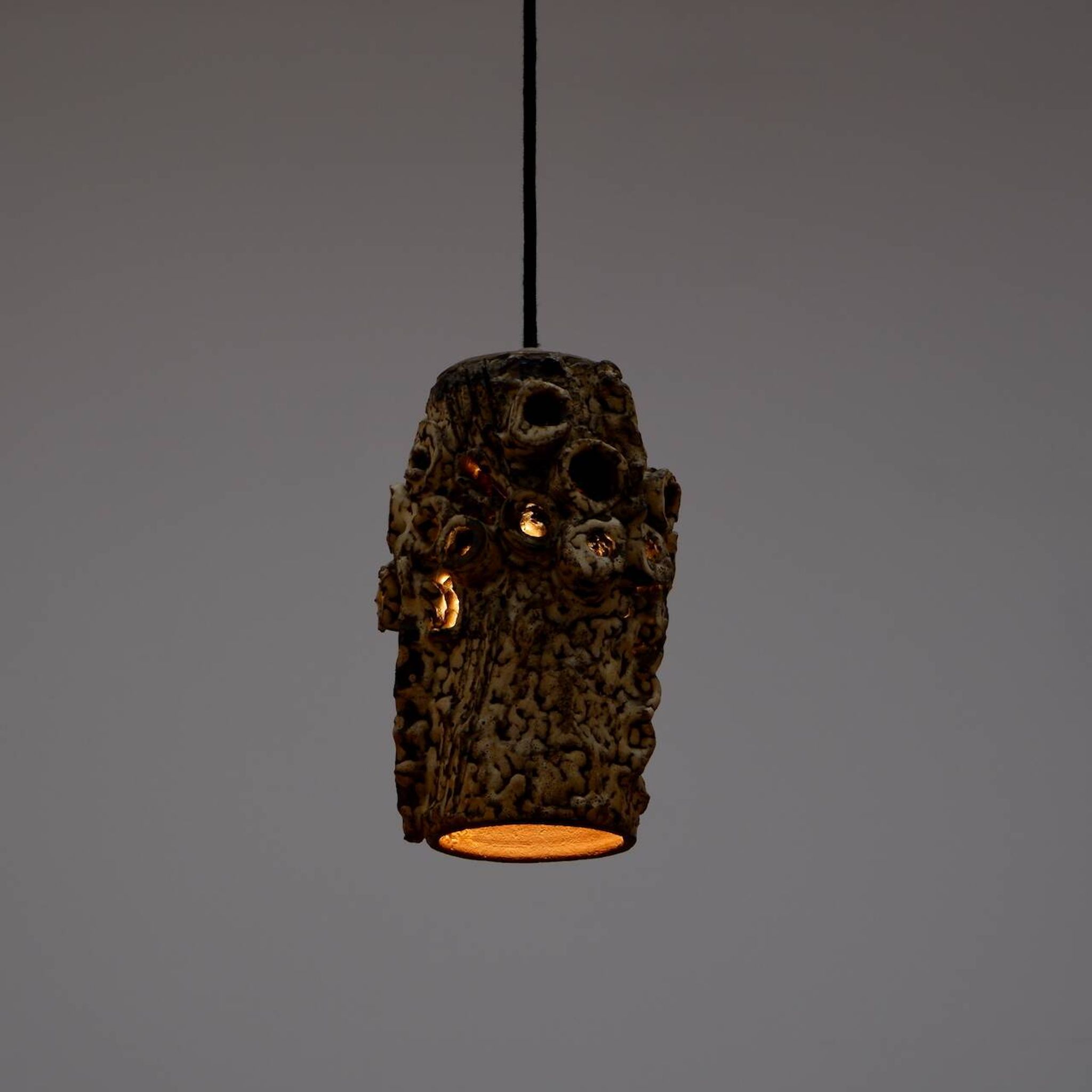 Sculptural ceramic pendant lamps by Bodil Marie Nielsen