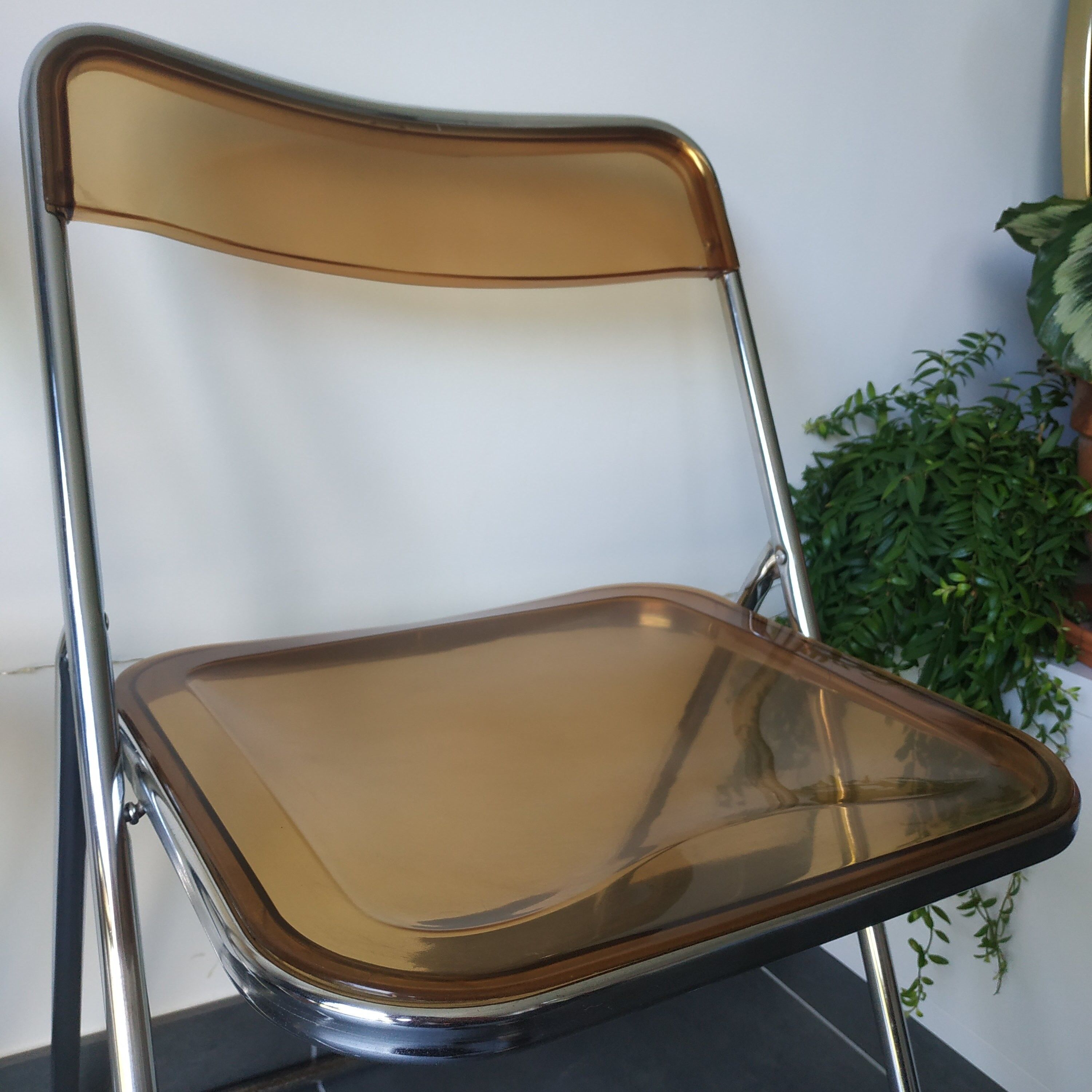Seventies stainless steel and caramel chairs