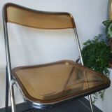 Seventies stainless steel and caramel chairs
