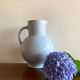 Antique vase in pale blue ceramic