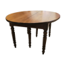 Oval walnut table with 5 extensions